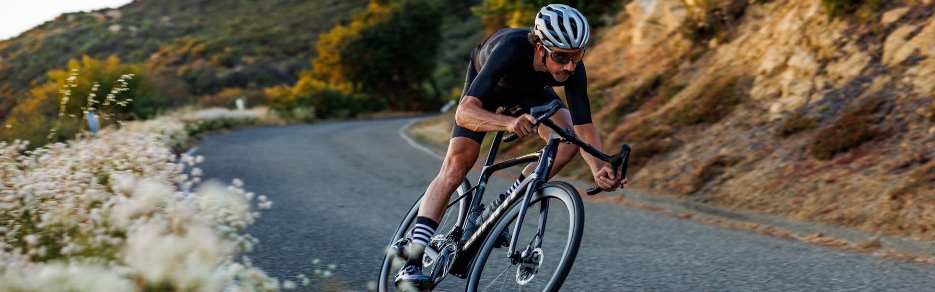 Man riding a giant road bike