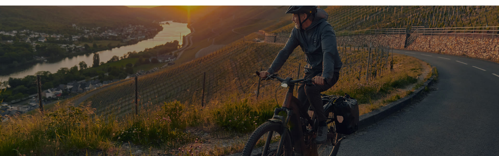 adventure biker in sunset