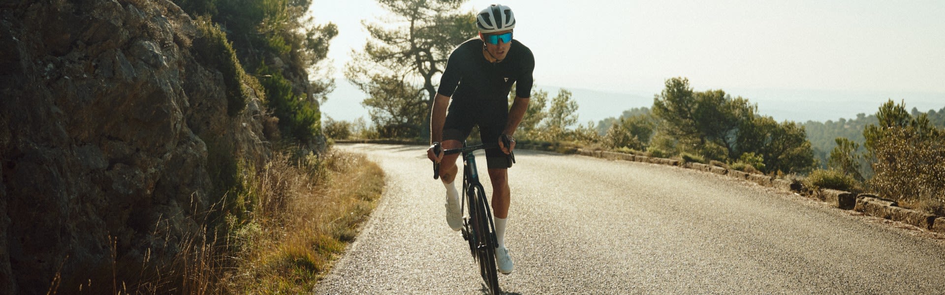Man on Giant road bike