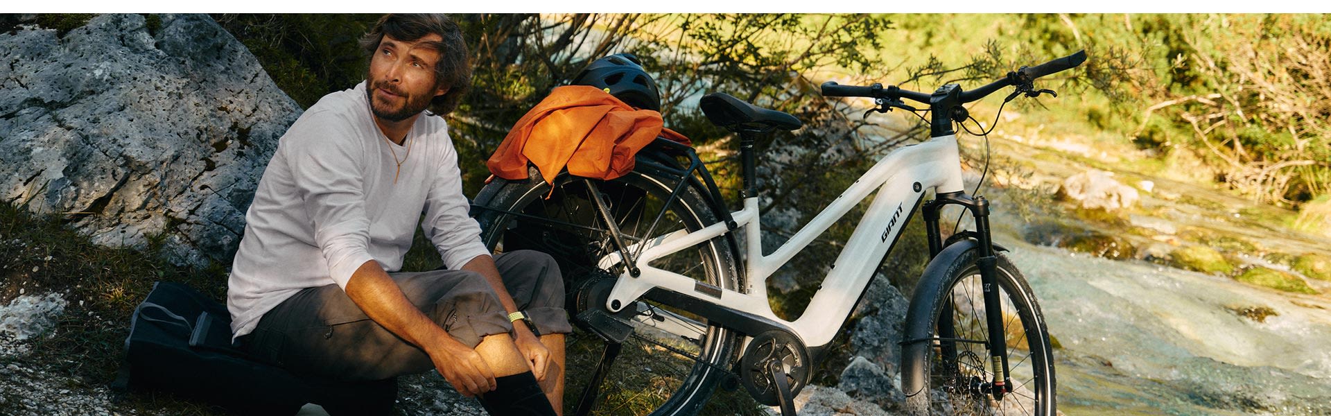 adventure biker in sunset