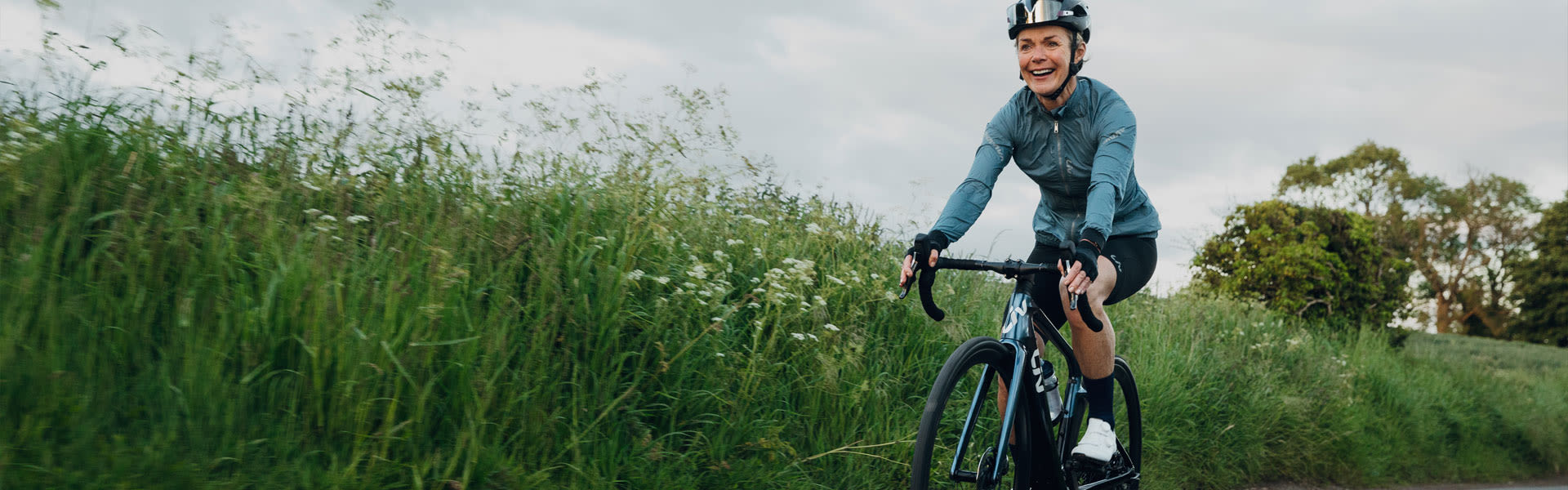 a woman riding a cruiser bike