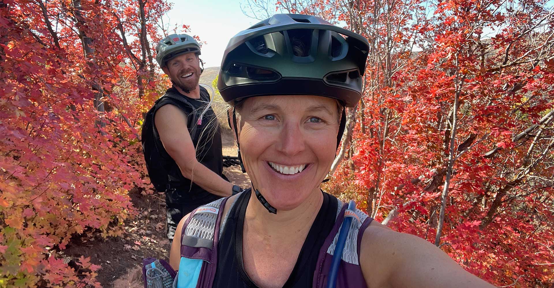 Selfie of Angela riding with a friend