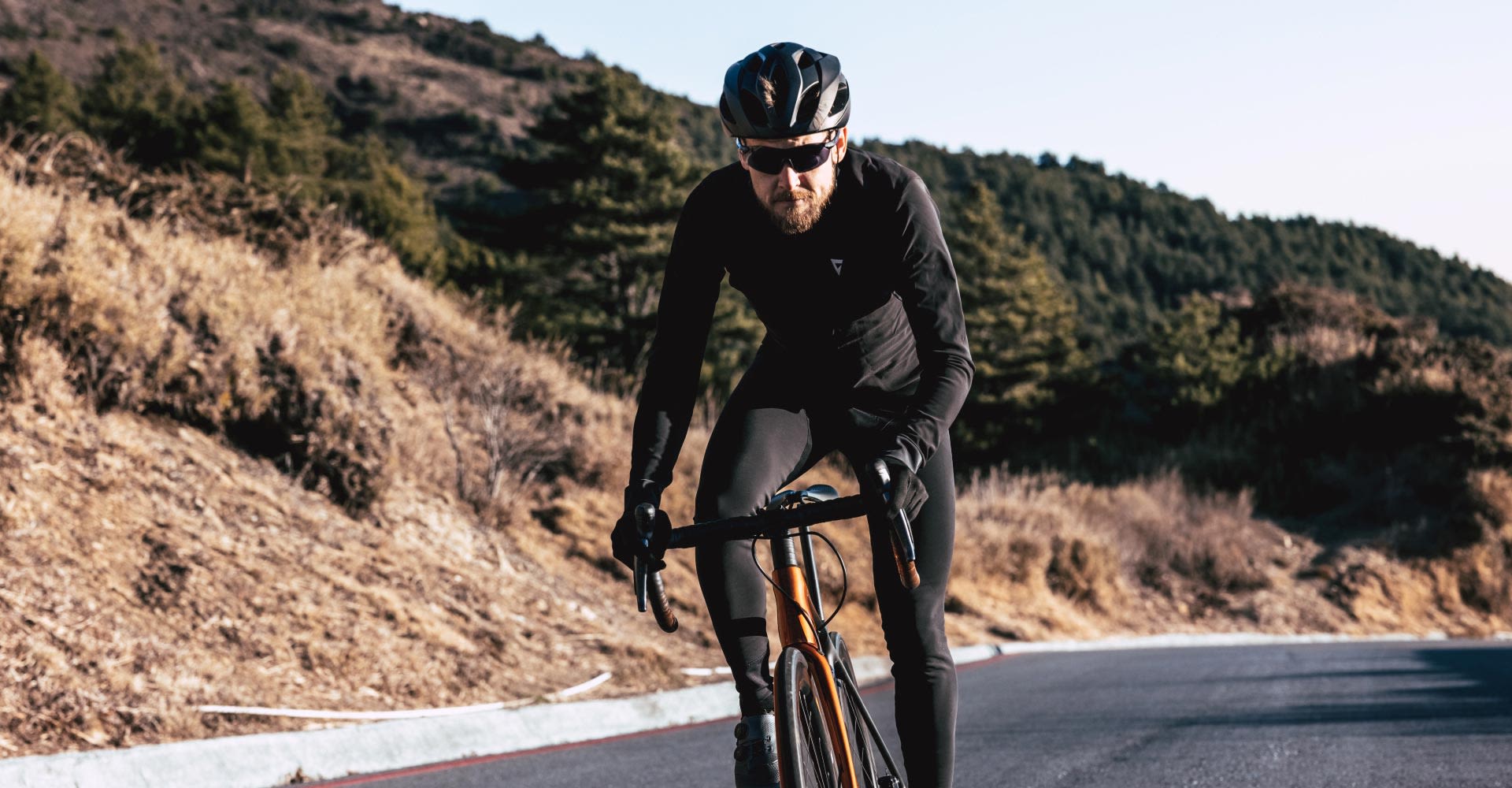Cyclist on bike in winter