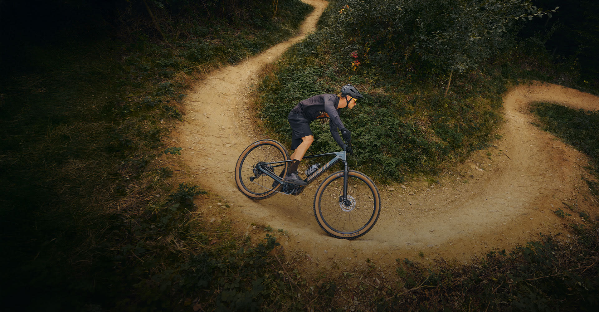 e mountain biker climbing