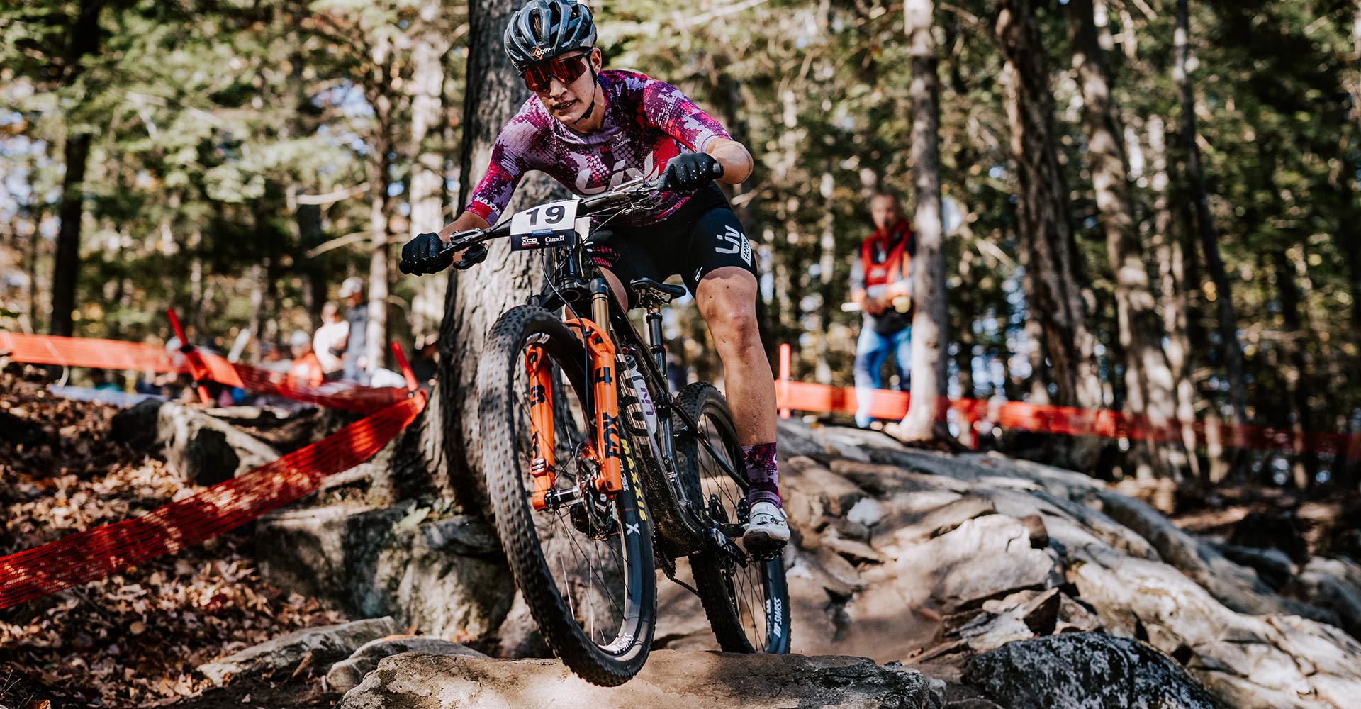 XC racer on pique mountain bike
