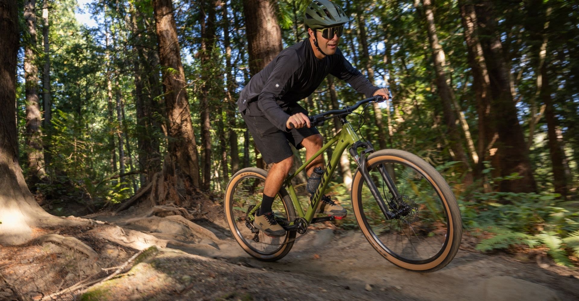 man riding giant mountain bike