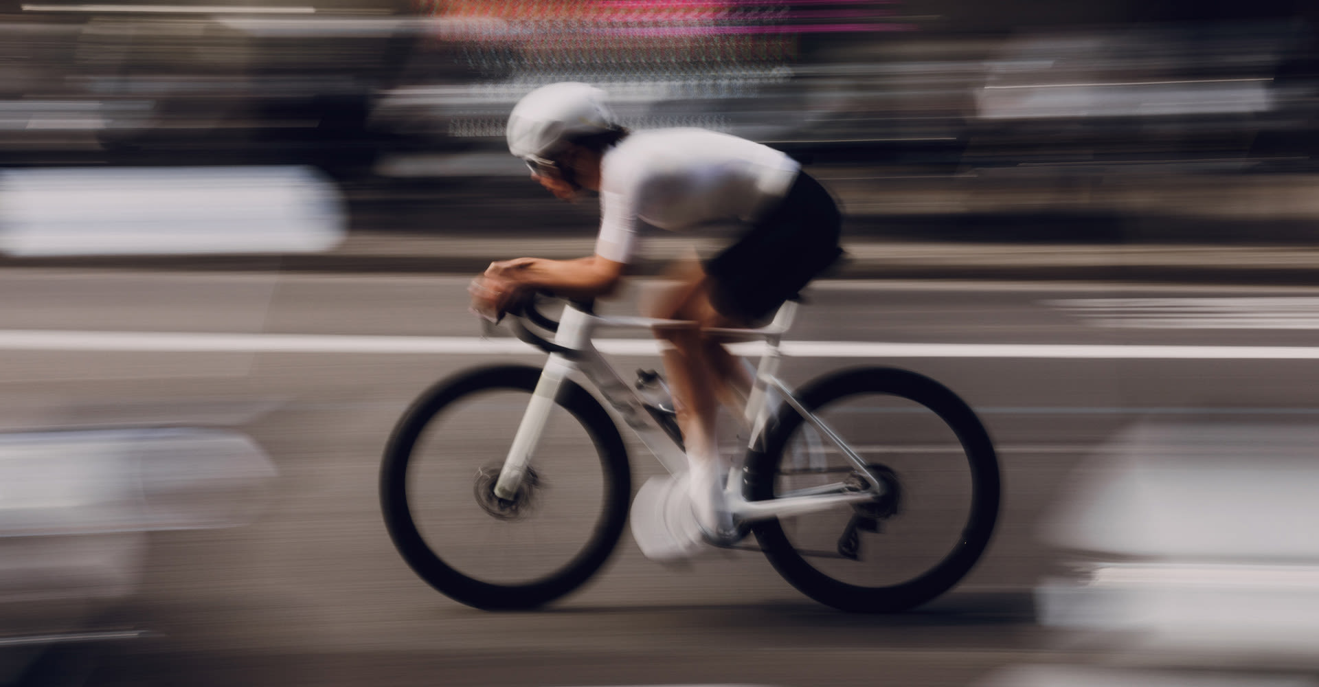 Blurred image of woman riding EnviLiv