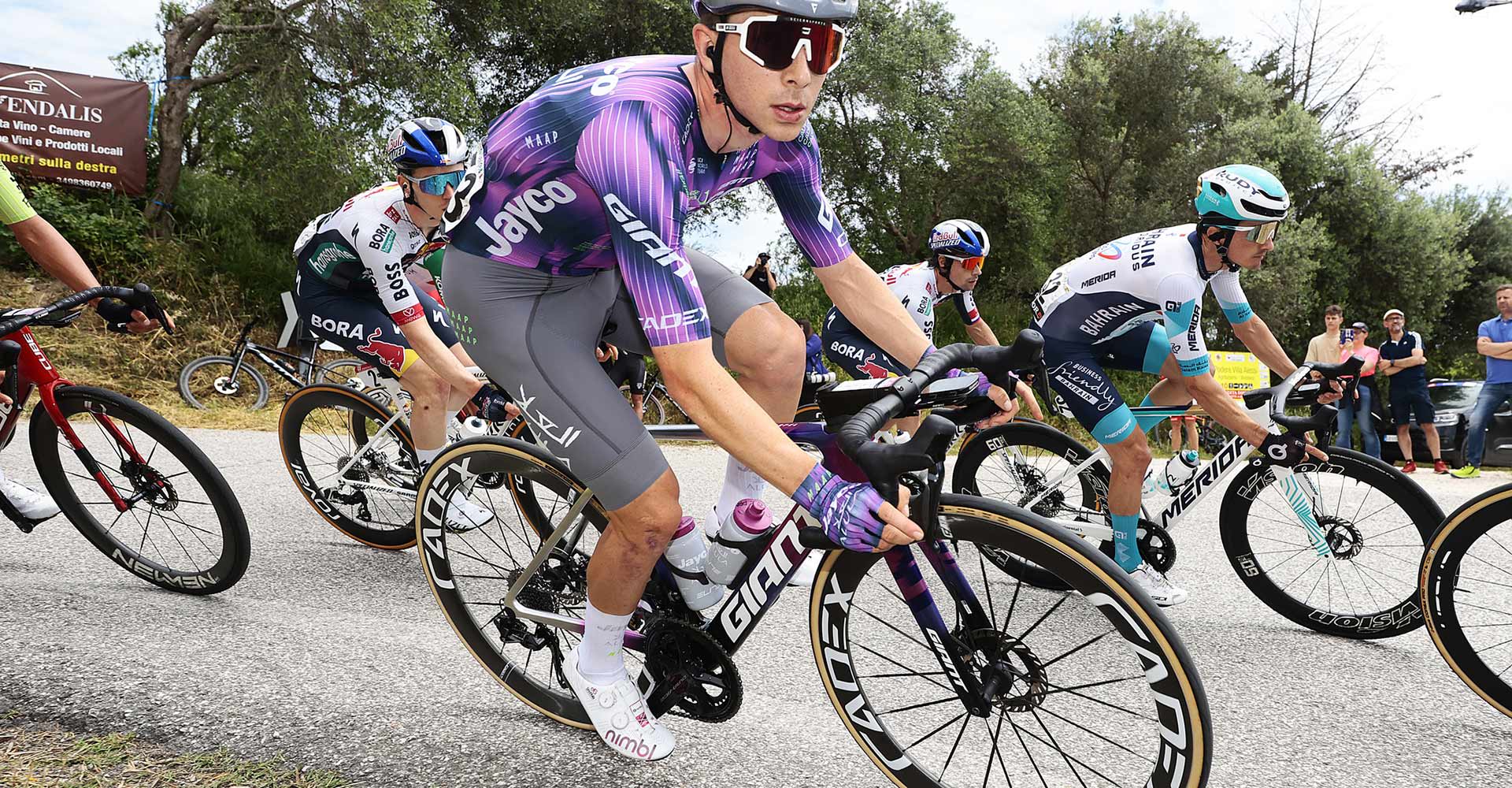 Road cyclist sprinting on road