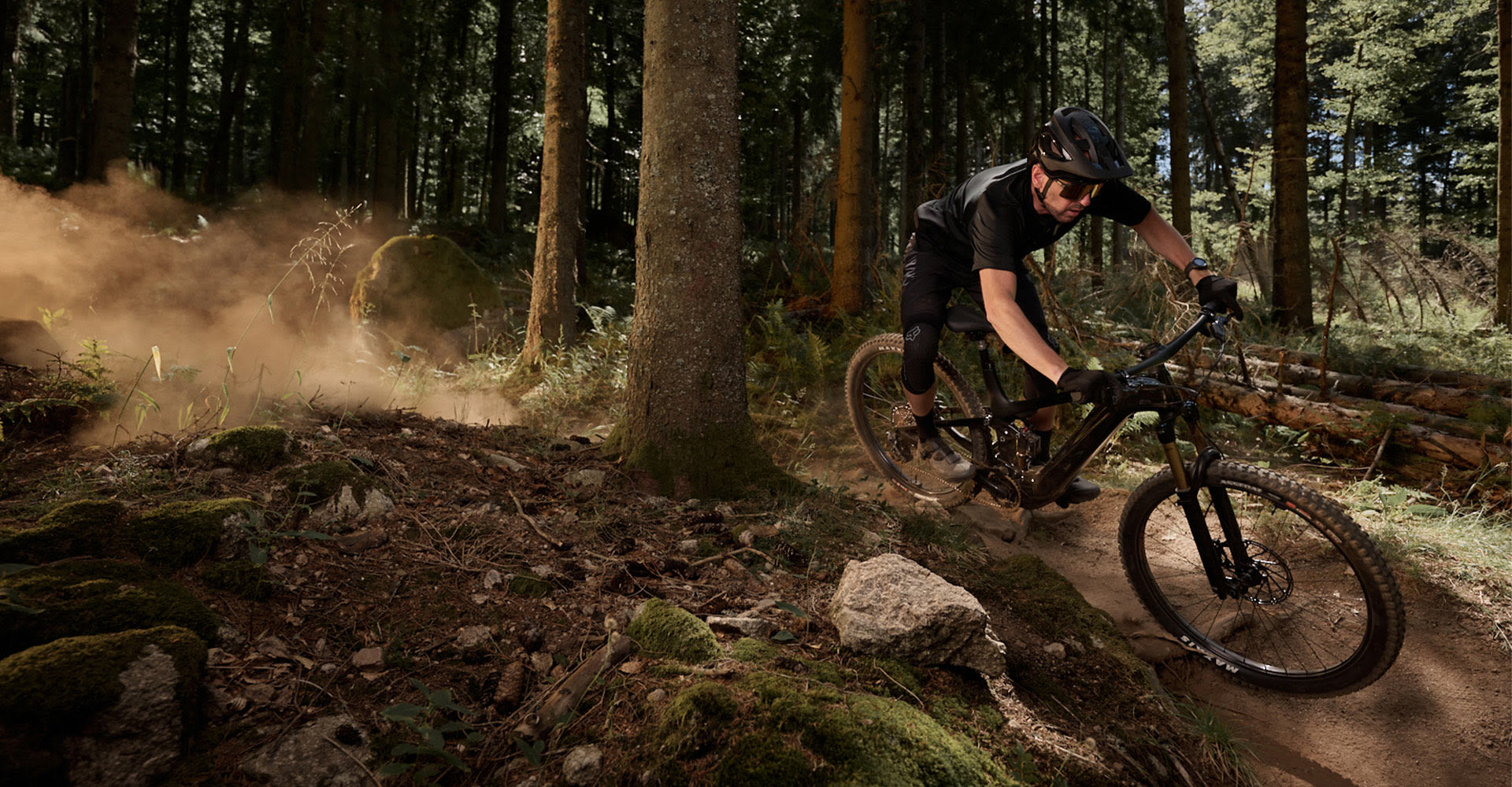 electric mountain biker in the woods