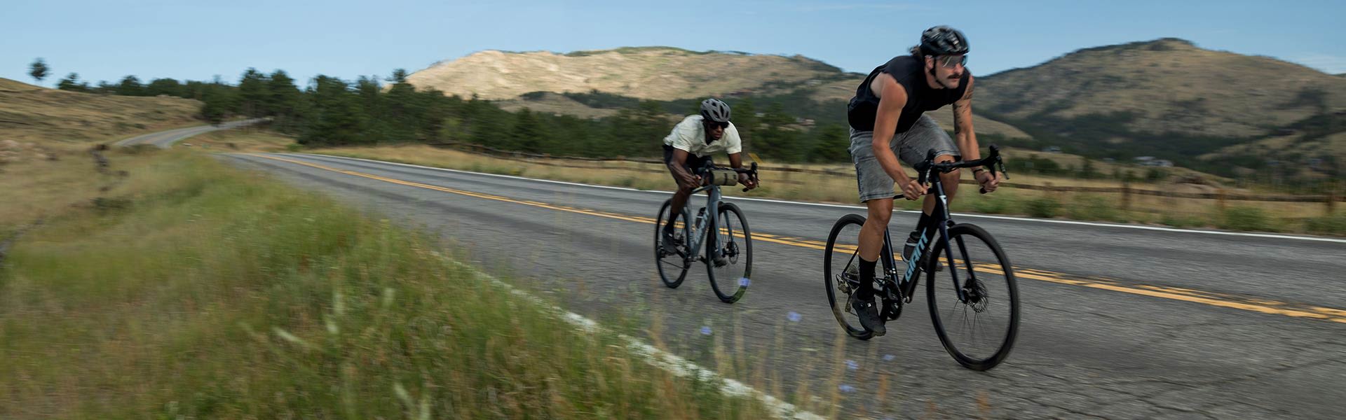 road bikers riding down road