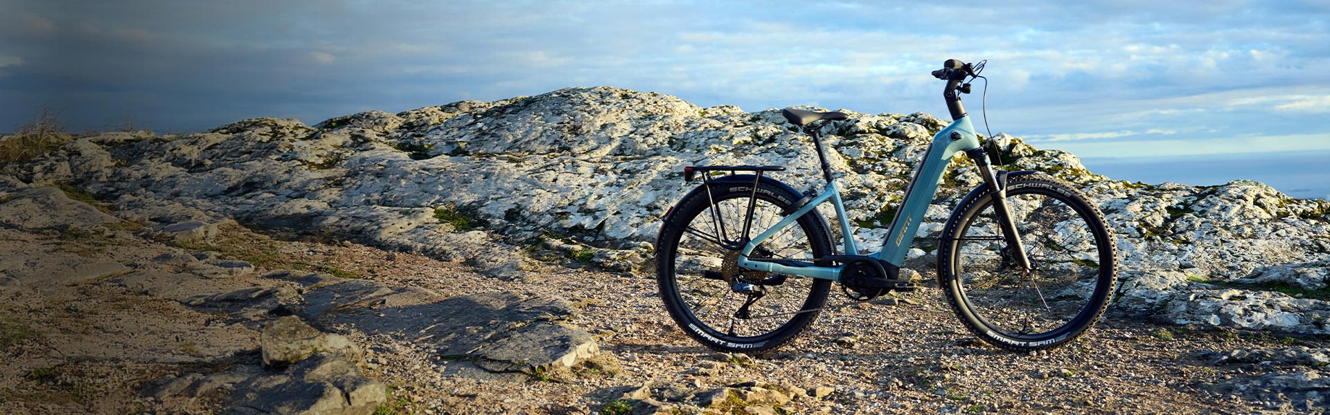 anytour x on rocky trail near sea