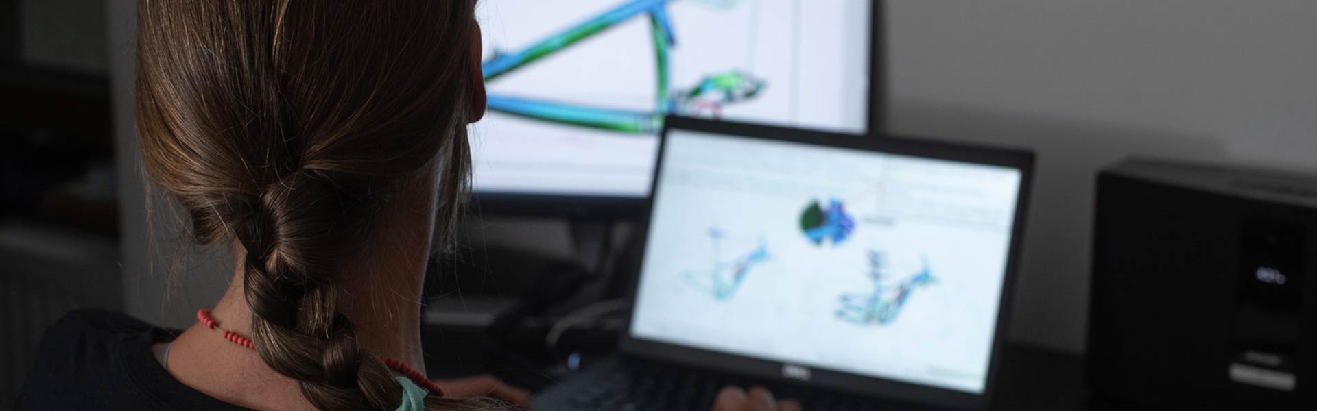 woman working in front of laptop
