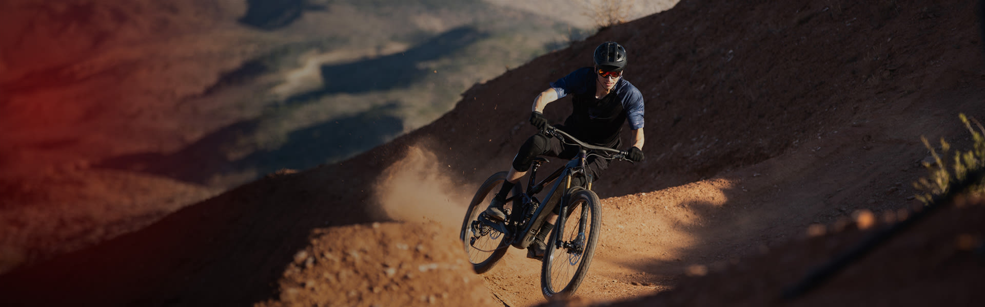 ebiker cornering on berm