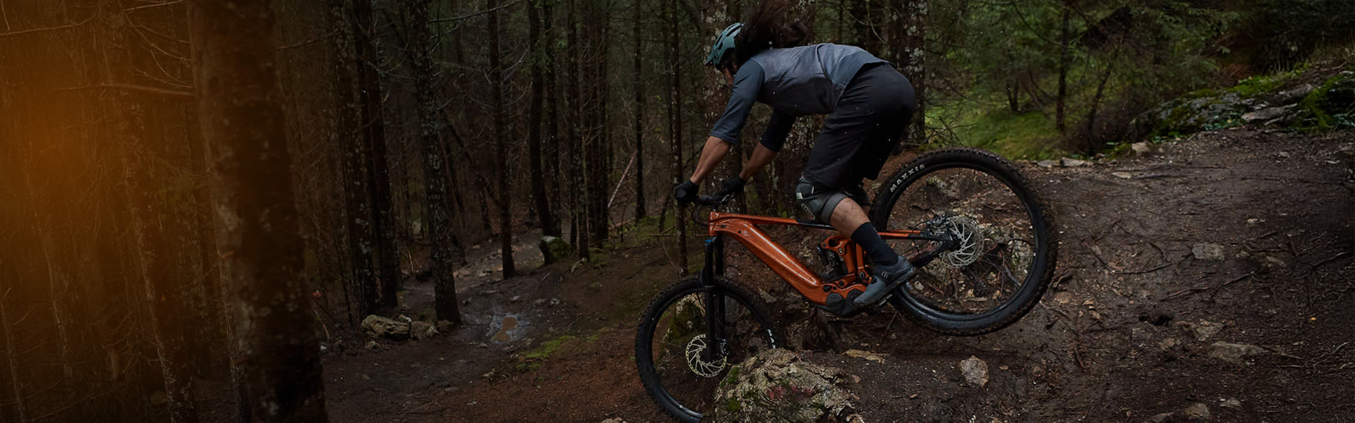 mountain biker descending on ebike