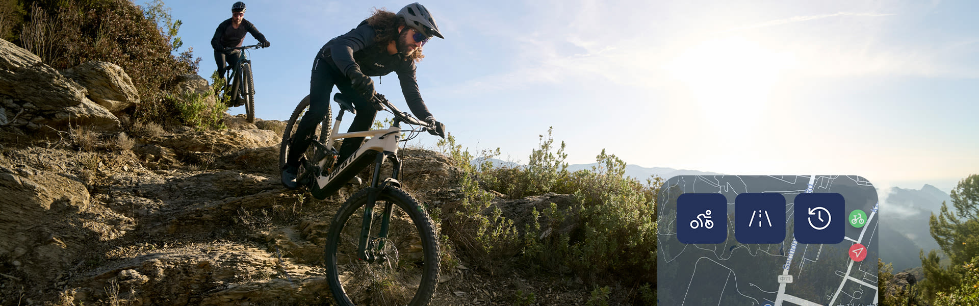 Mountain biker descending a rocky face.