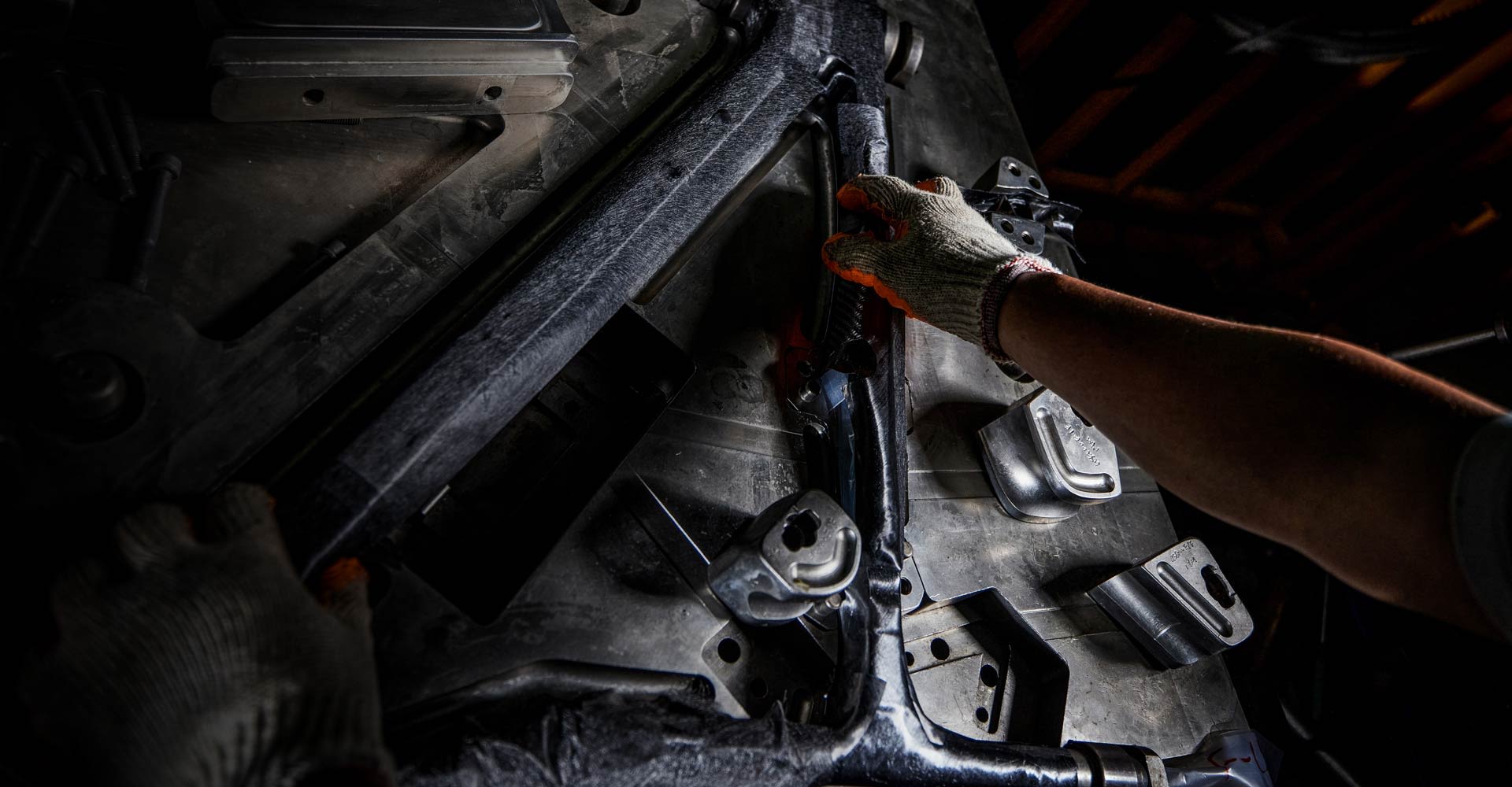 carbon frame being laid upinto mould
