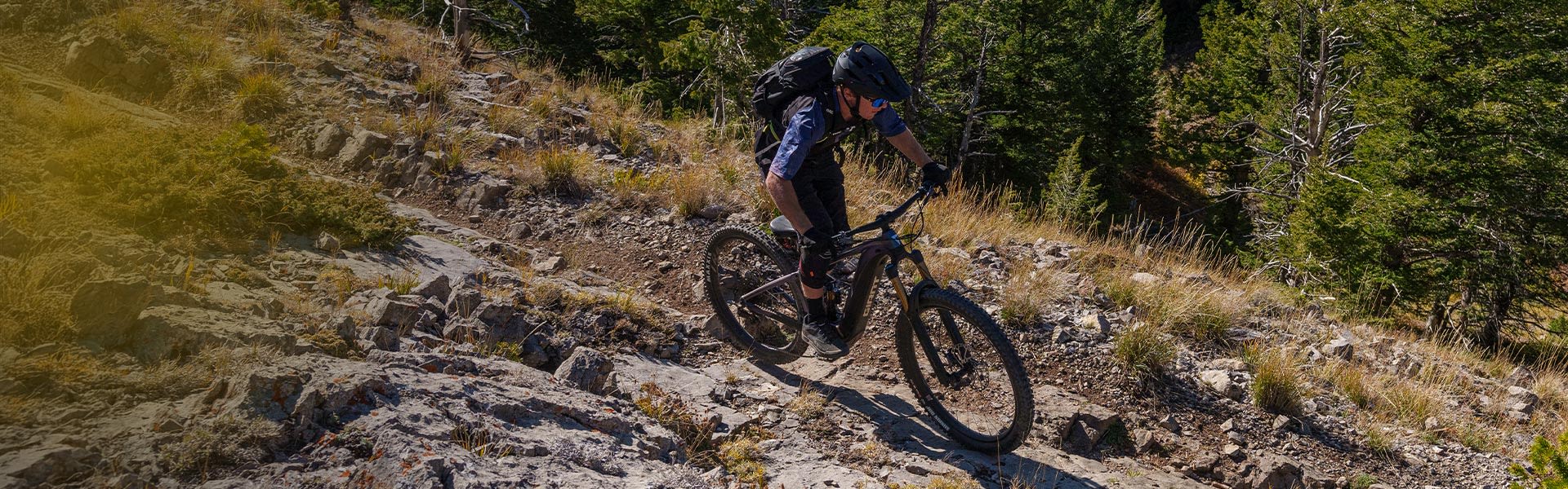 mountain biker descending on ebike