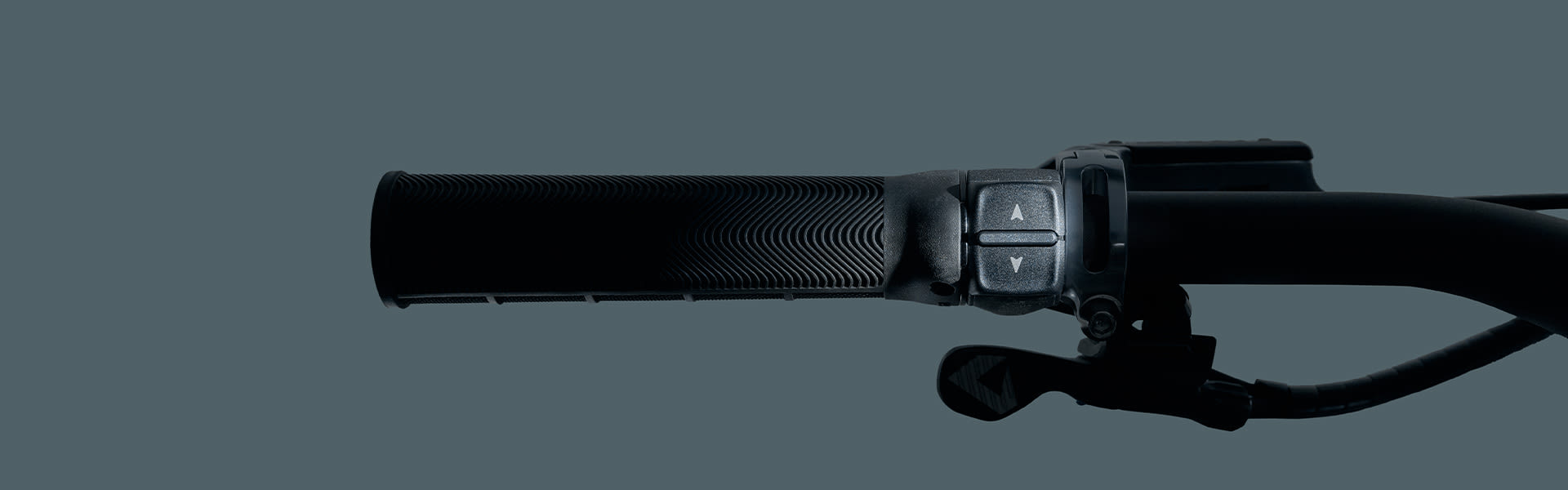 controls next to grip on handlebar