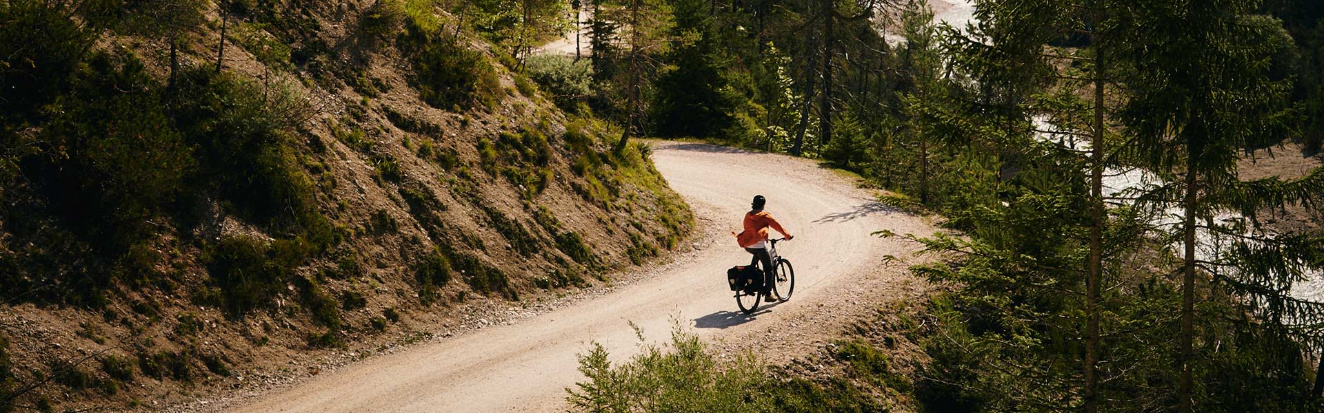 electric adventure biker on scenic road