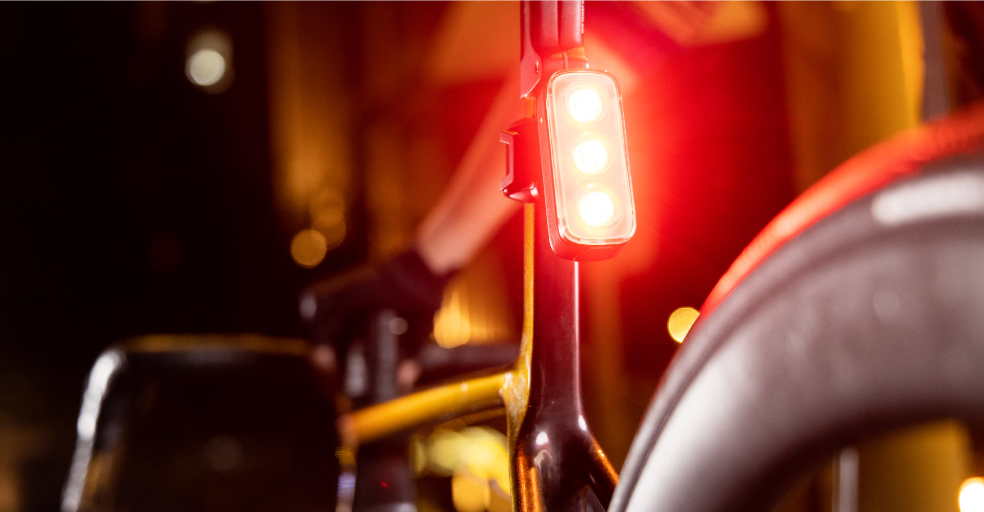closeup of TL300 tail light on road bike