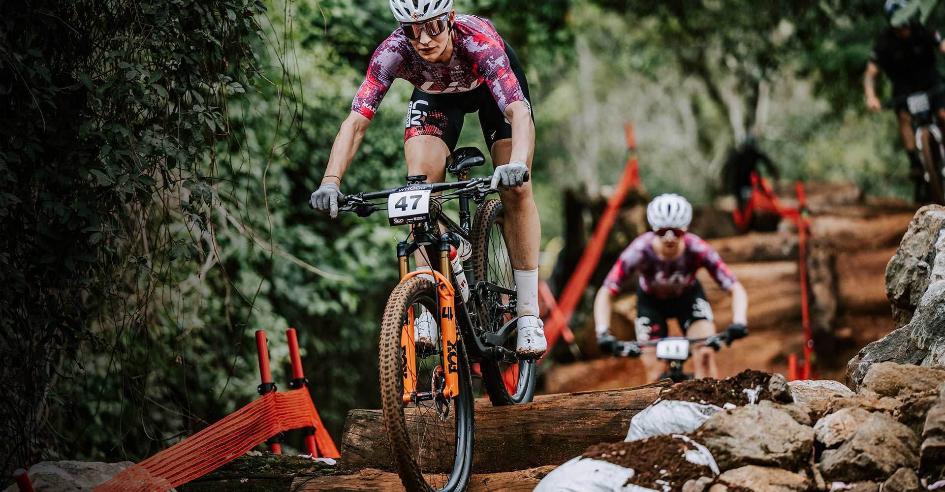 Linda riding down rock