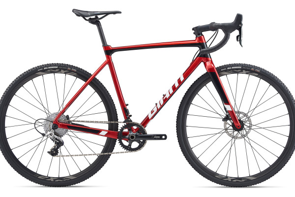 The 2020 TCX SLR 1 in metallic red features Maxxis All-Terrene tires and SRAM Rival hydraulic brakes. Availability varies by country.