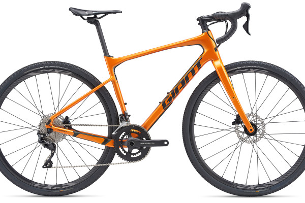 The 2019 Revolt Advanced 2 in Metallic Orange / Gun Metal Black. Availability varies by country.