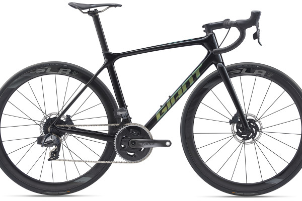 The 2020 TCR Advanced Pro 0 Disc Force in Carbon & Chameleon Terra features SRAM Force eTap AXS drivetrain and hydraulic brakes. Availability varies by country.