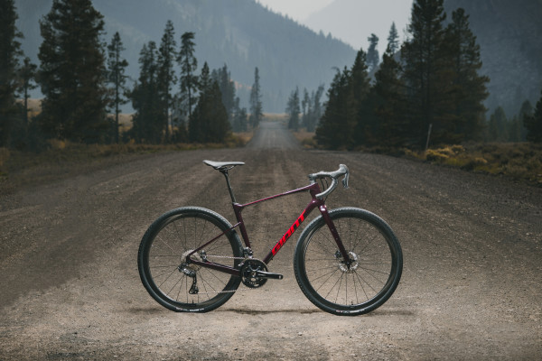 The Revolt Advanced Pro 0 in Dark Red features an all-new Giant CXR 1 Carbon Disc WheelSystem; a D-Fuse SLR composite seatpost and Contact SLR XR D-Fuse composite handlebar; and a Shimano GRX Di2 drivetrain. Availability varies by country. Cameron Baird photo. 