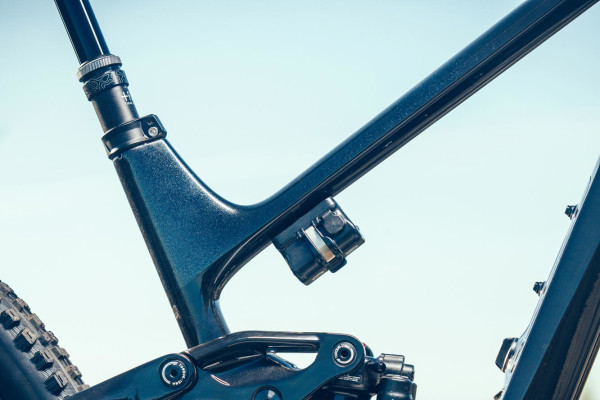 Frame details include integrated protection on the drive-side chainstay and underside of the down tube.
