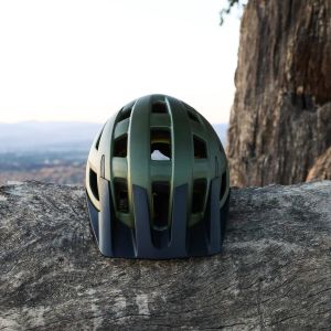 Giant Path MIPS helmet on a rock