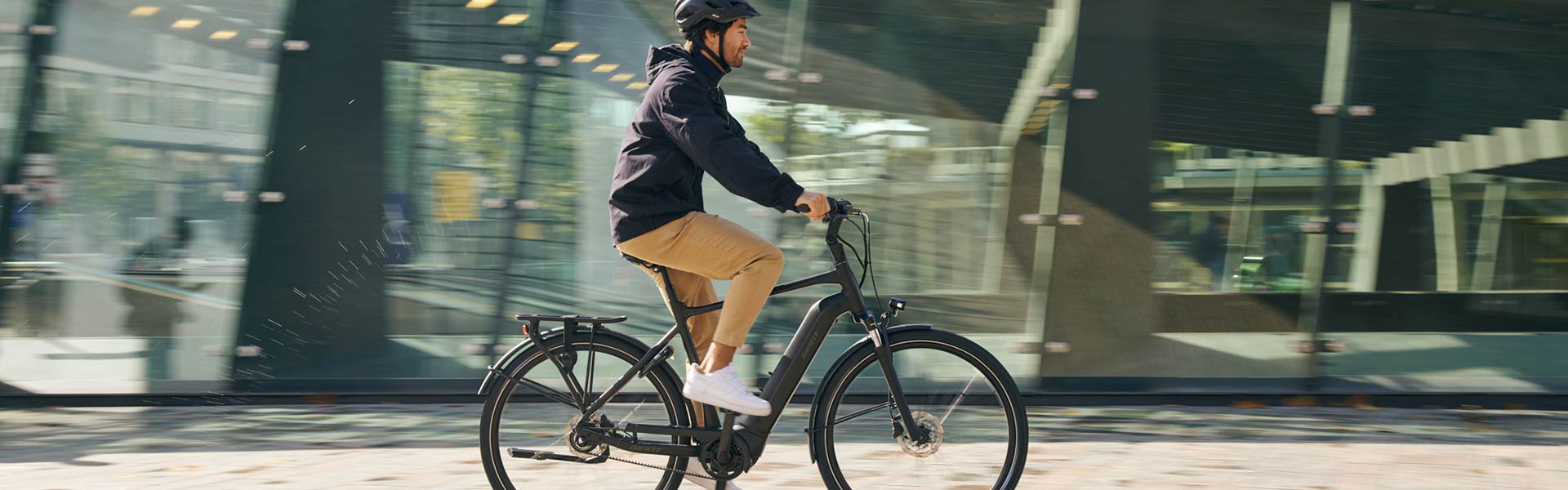 Cyclists on an electric bike in the city