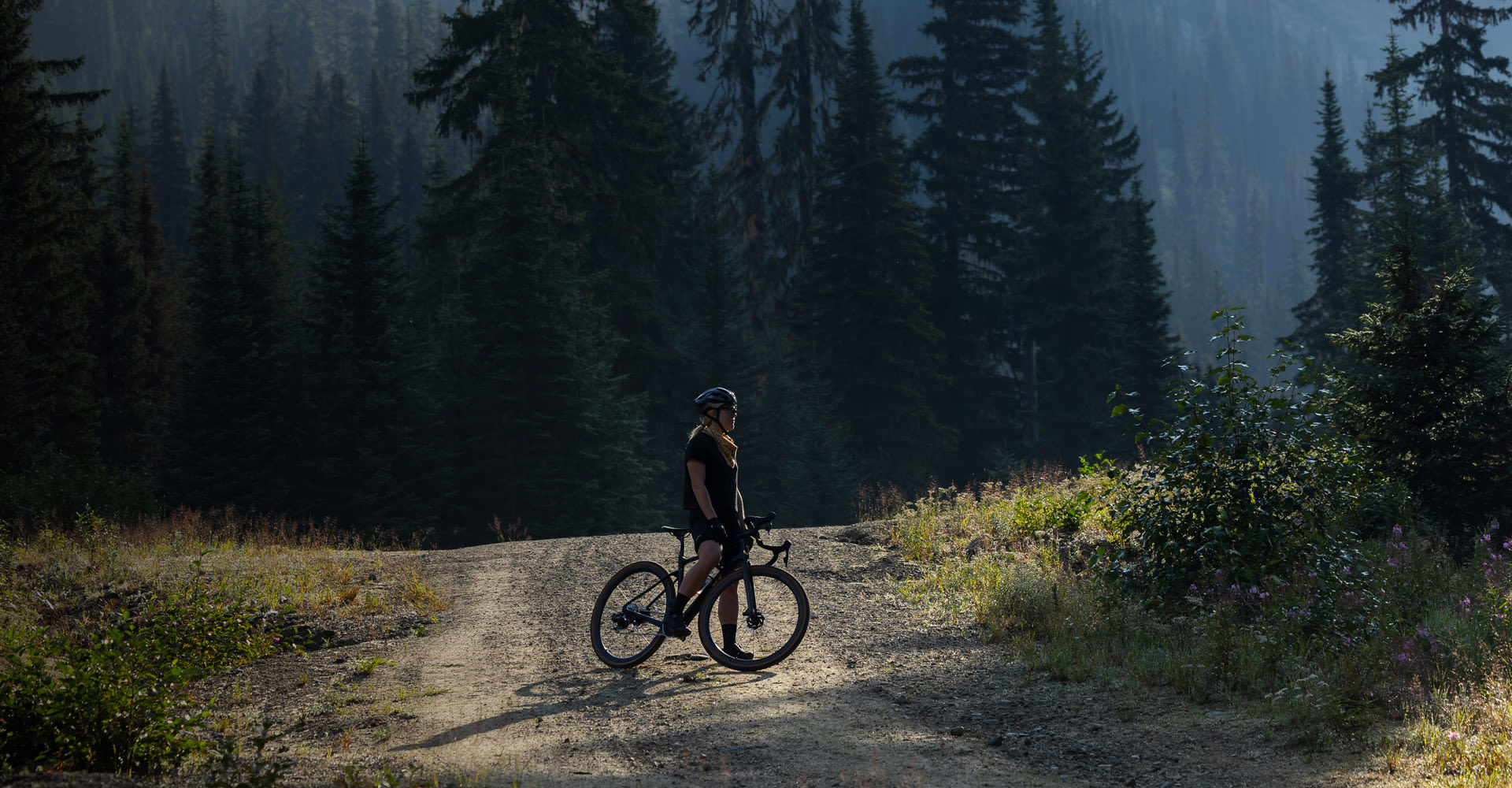 a woman on a gravel road on the Devote
