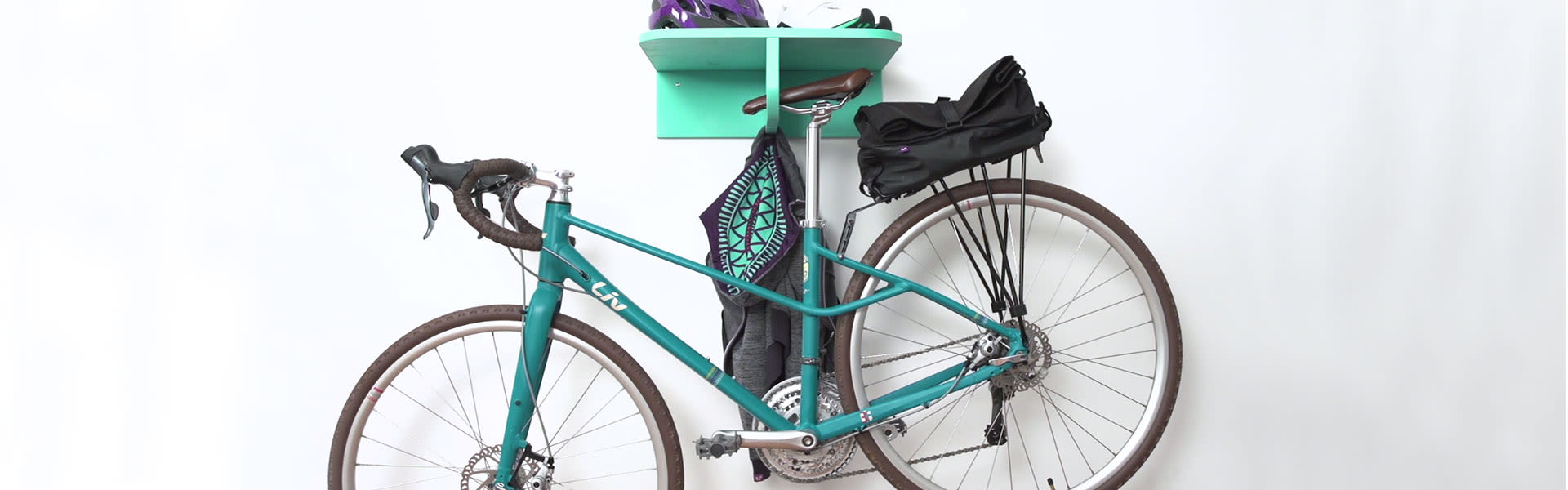Estable excursionismo Alfombra de pies Cómo hacer un gancho para bicicleta con accesorios de tubería. | Liv  Cycling España
